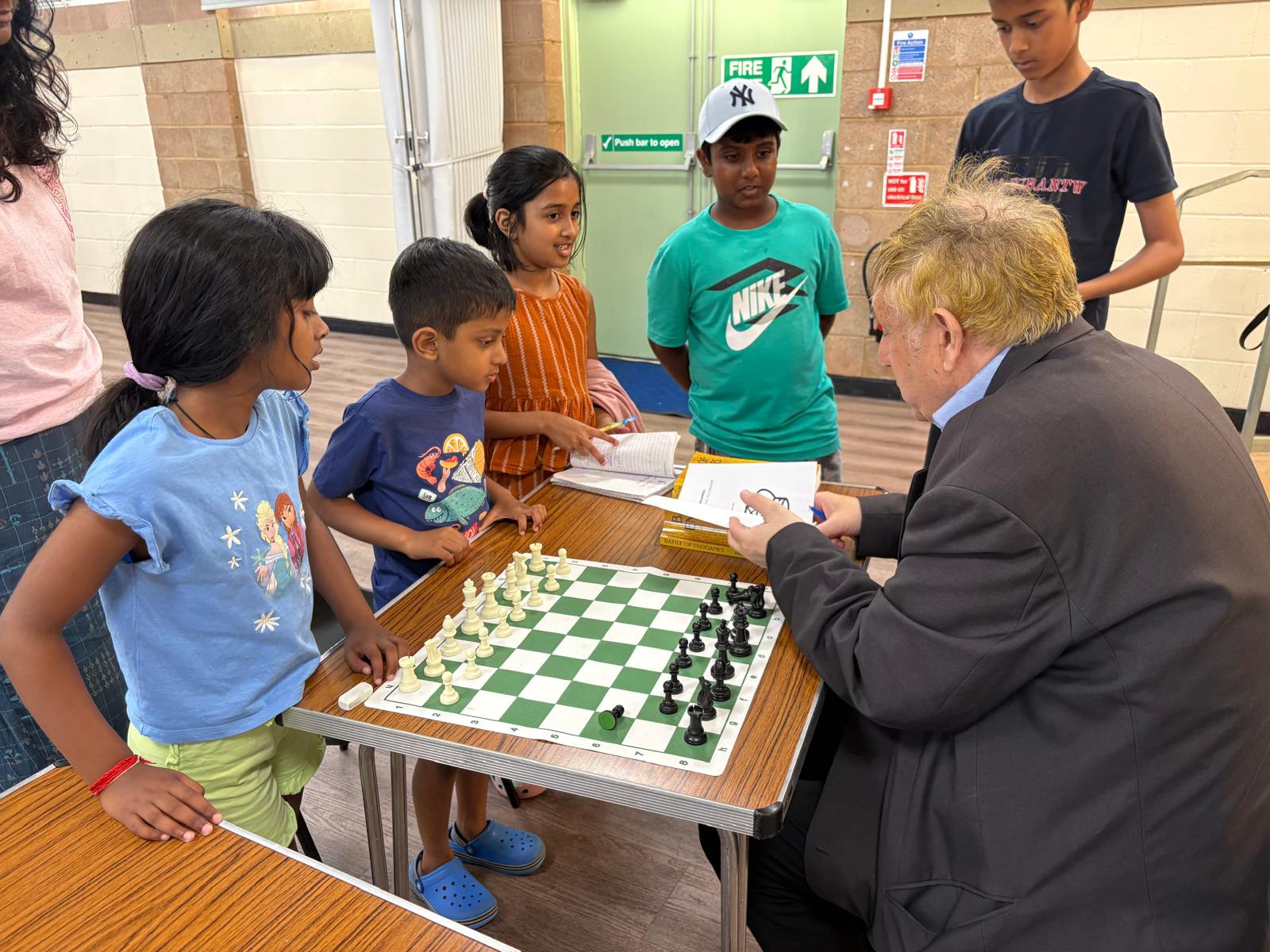 Club members playing chess