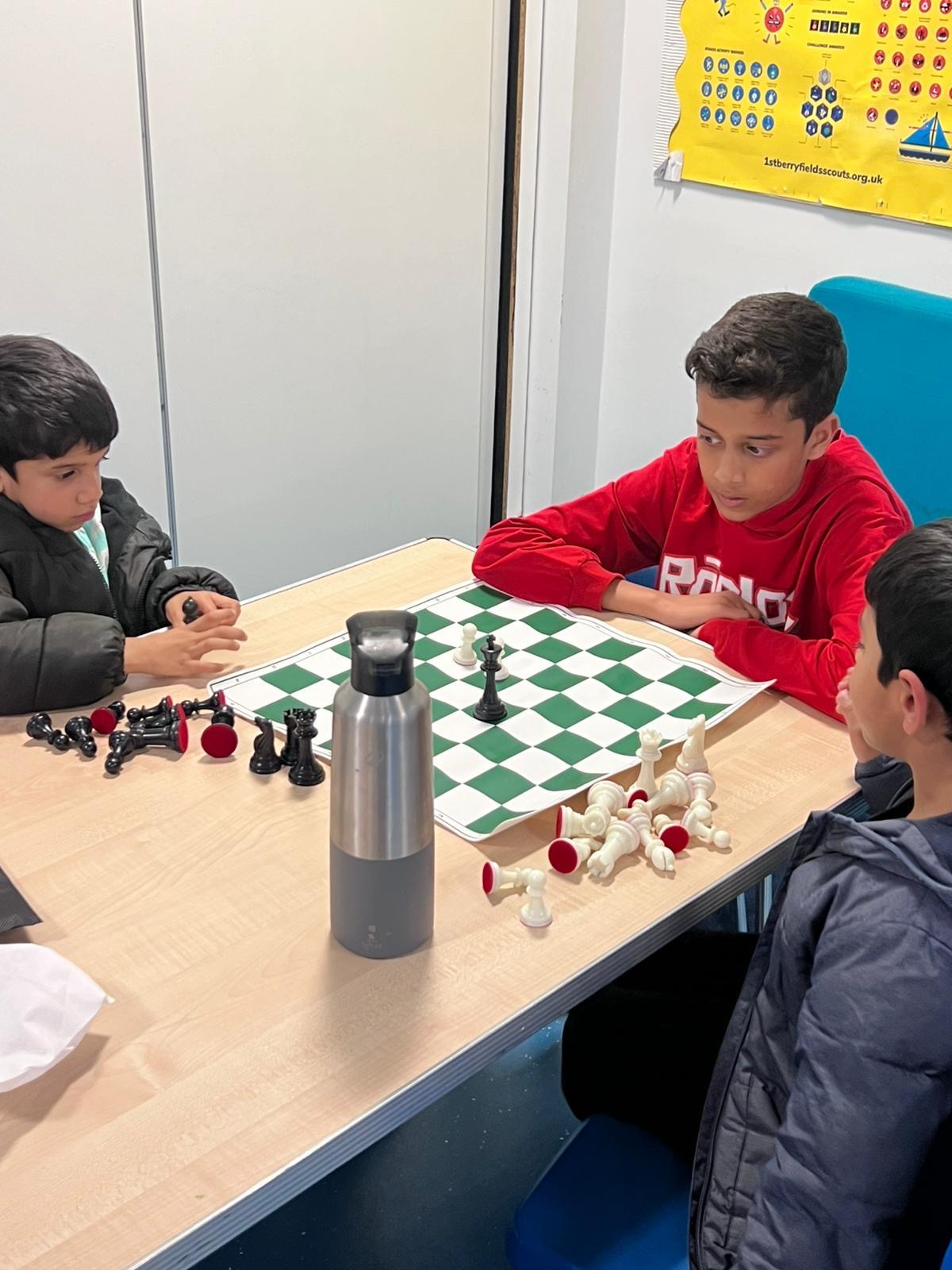 Juniors playing chess at the club