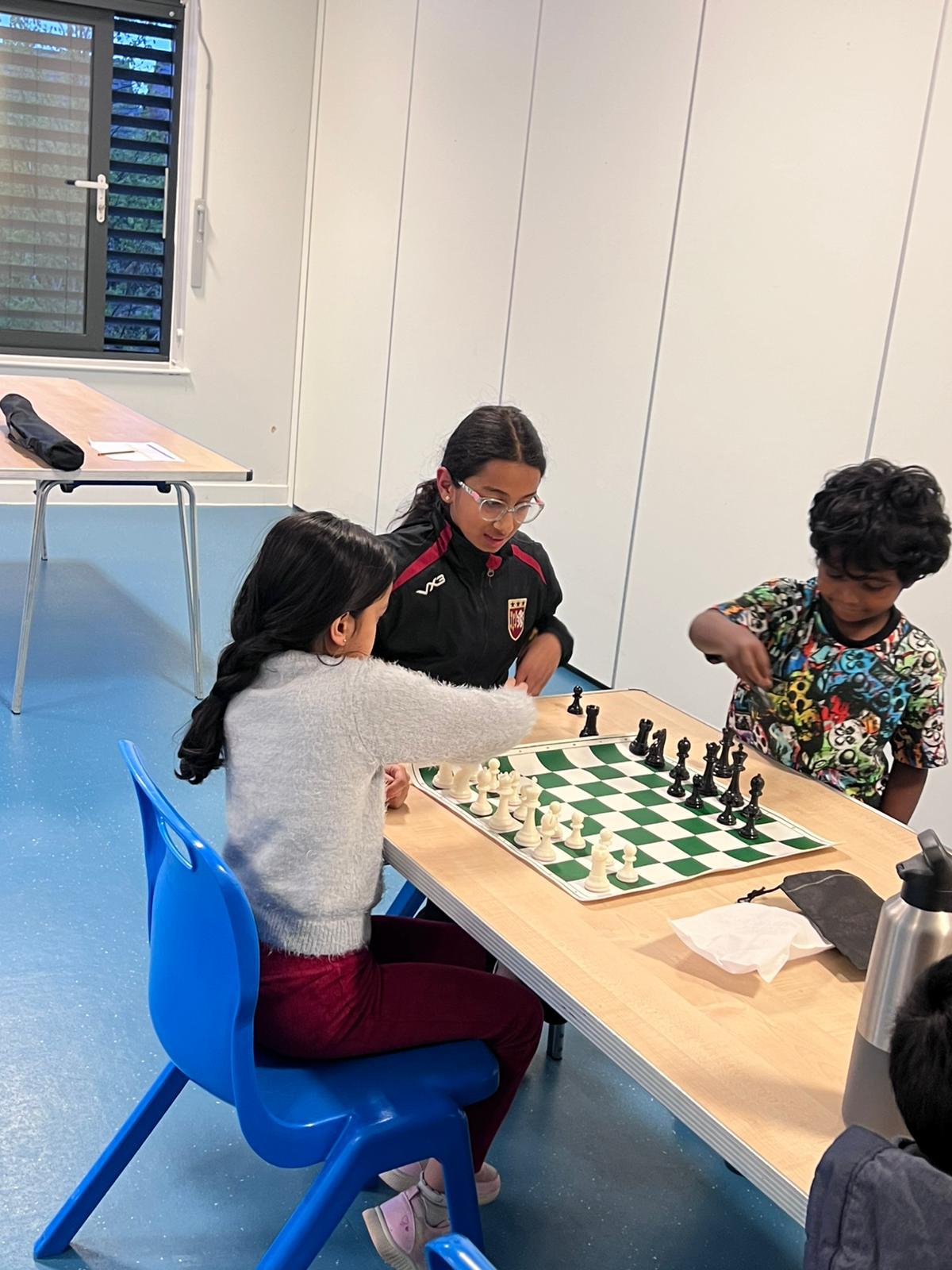 Mixed group enjoying a chess session